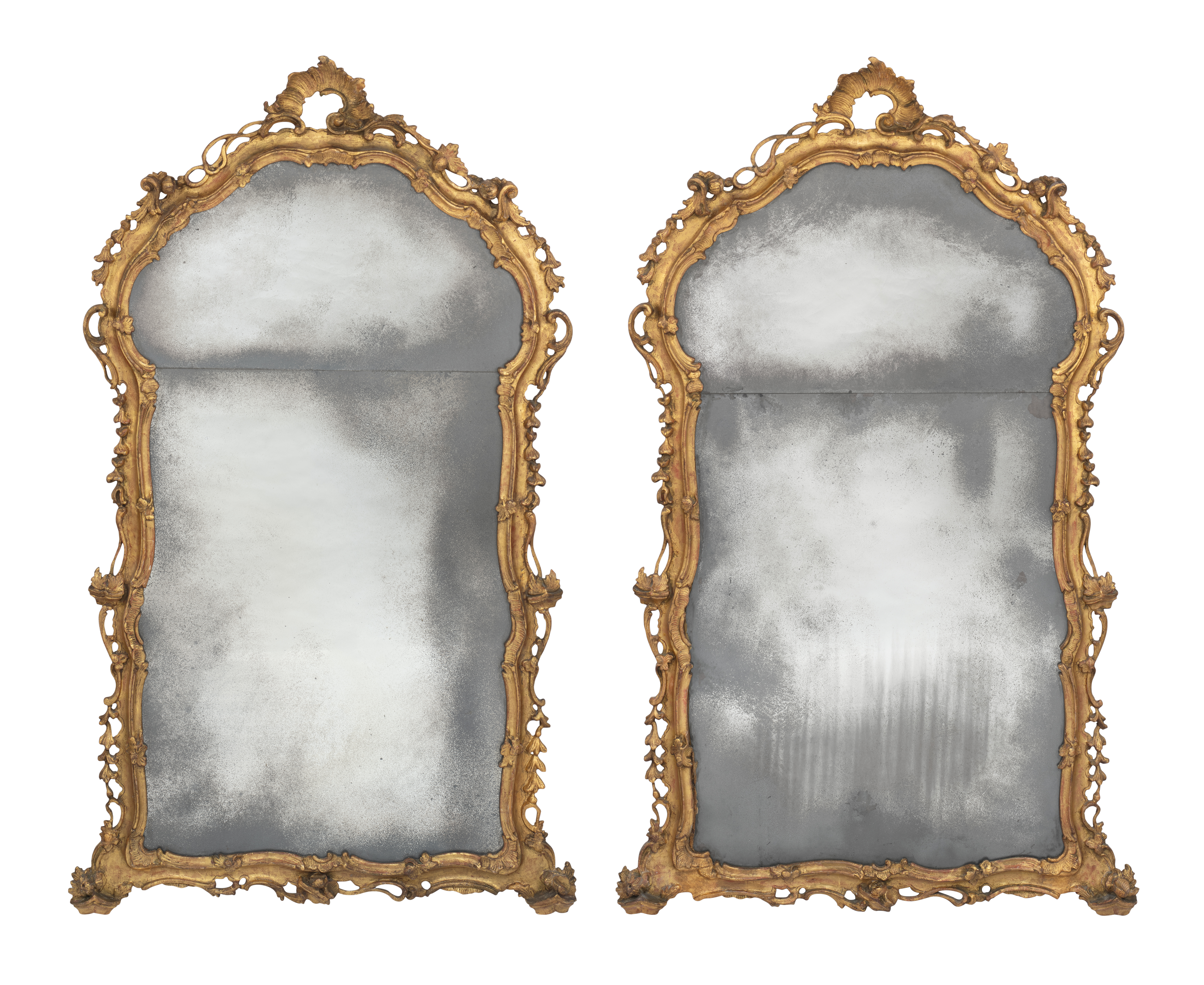 A pair of North Italian carved giltwood rococo mirrors.